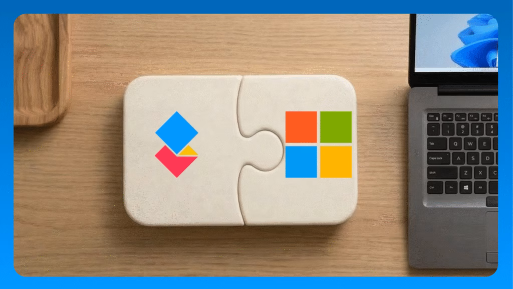 Two puzzle pieces fitting together on a desk alongside a Microsoft tablet, representing the AODocs and Microsoft 365 integration.